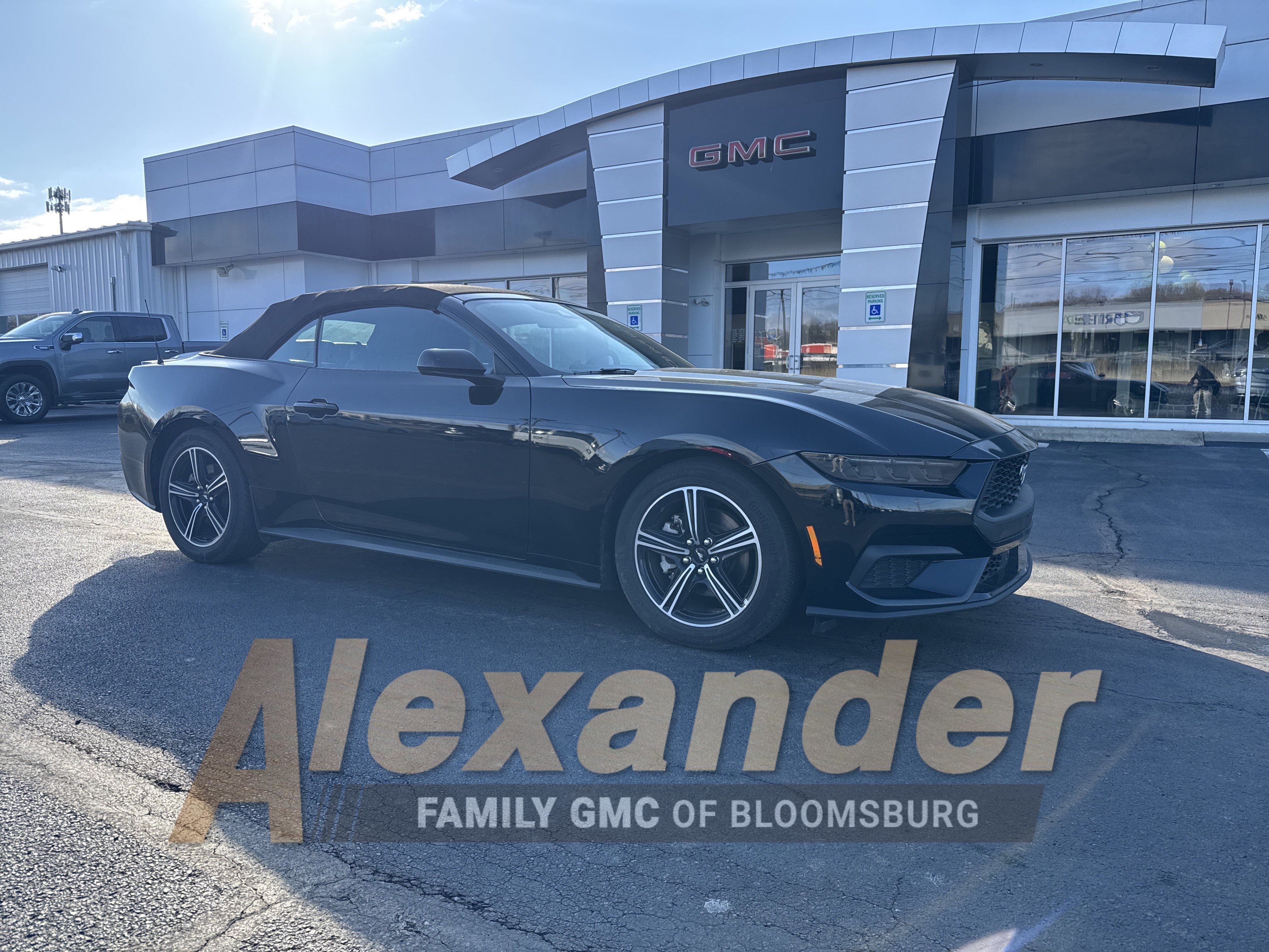 2025 Ford Mustang EcoBoost in Shadow Black — front three-quarter view
