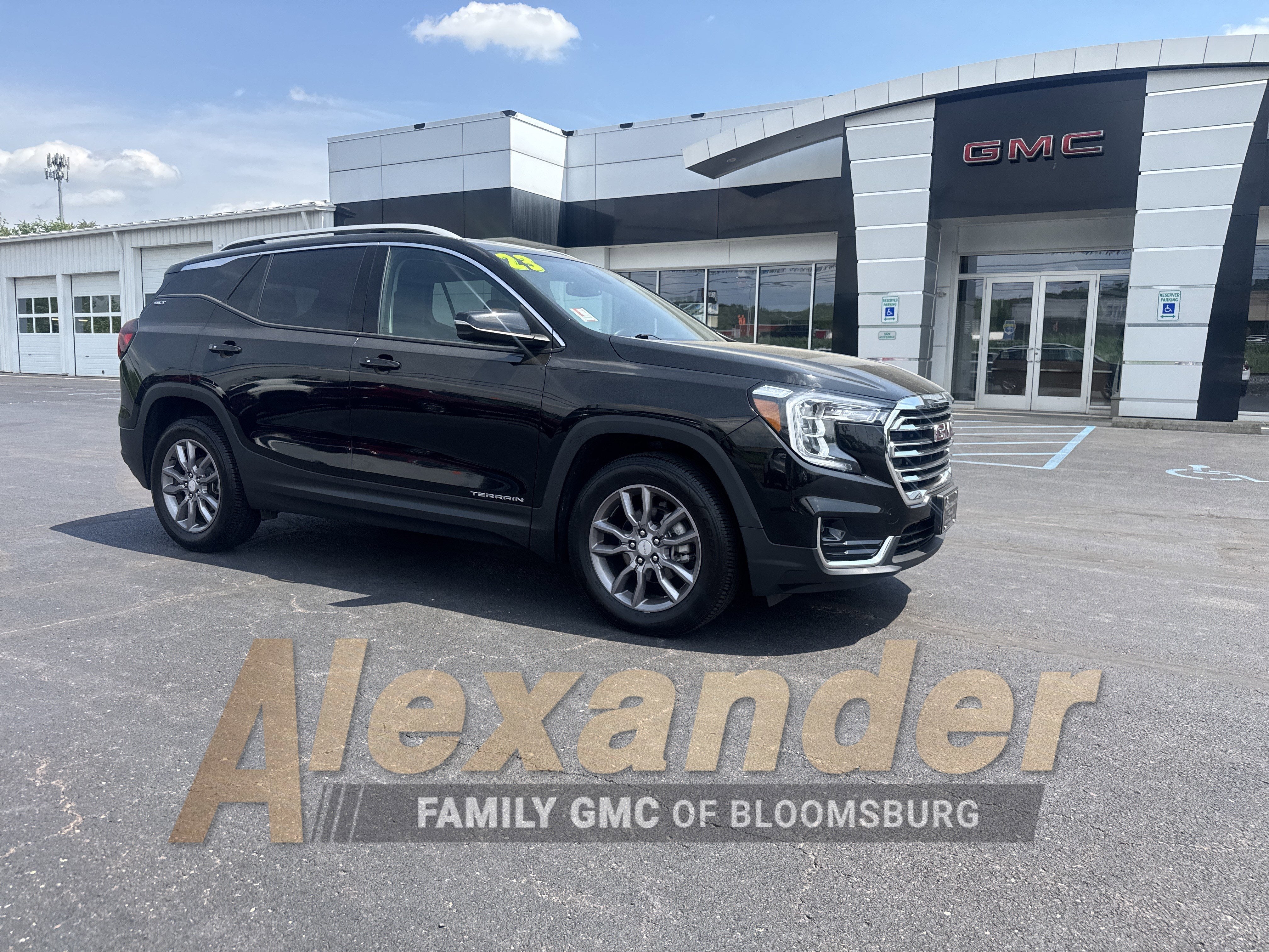 2023 GMC Terrain SLT in Ebony Twilight Metallic — front three-quarter view