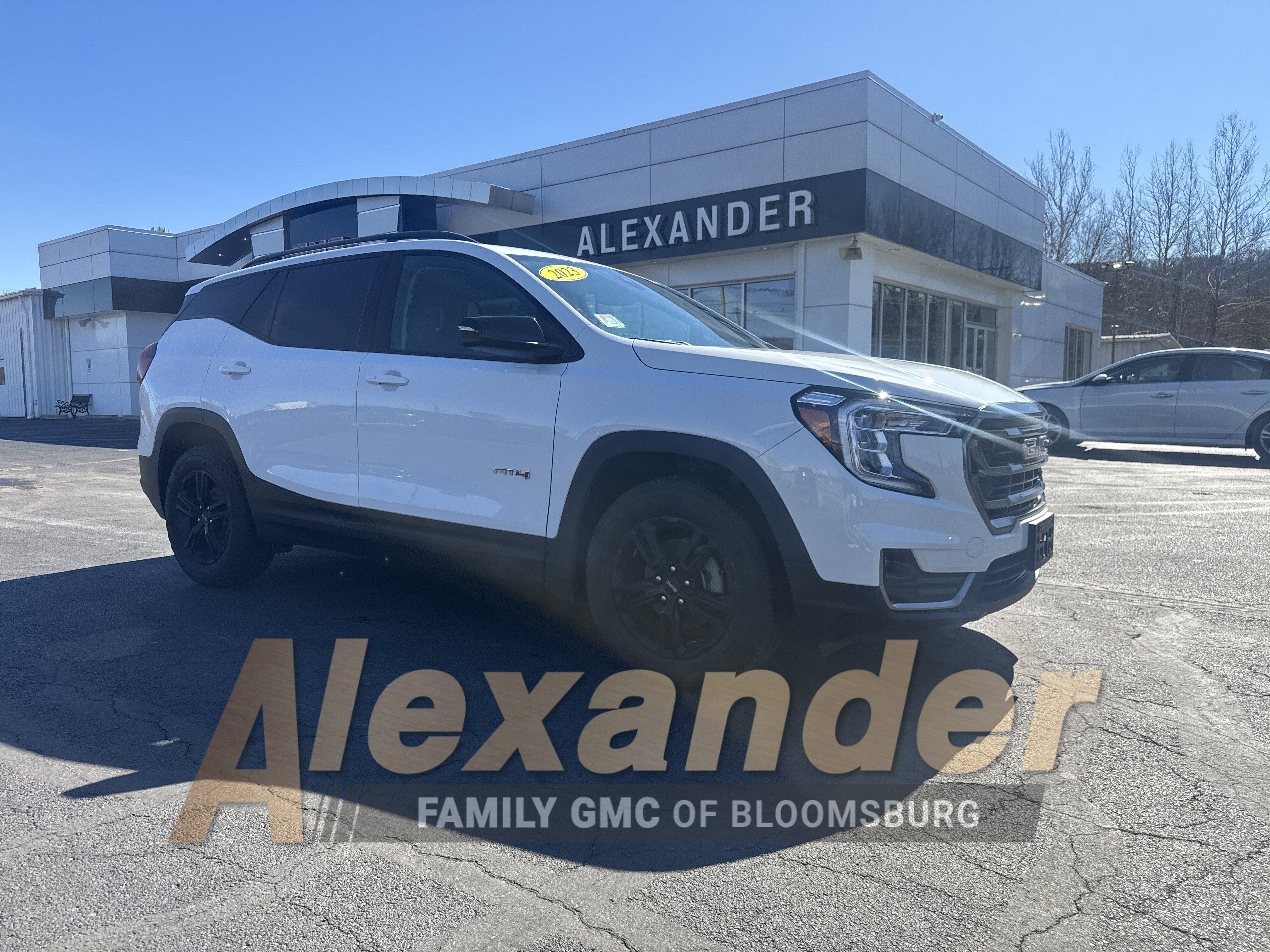 2023 GMC Terrain AT4 in Summit White — front three-quarter view