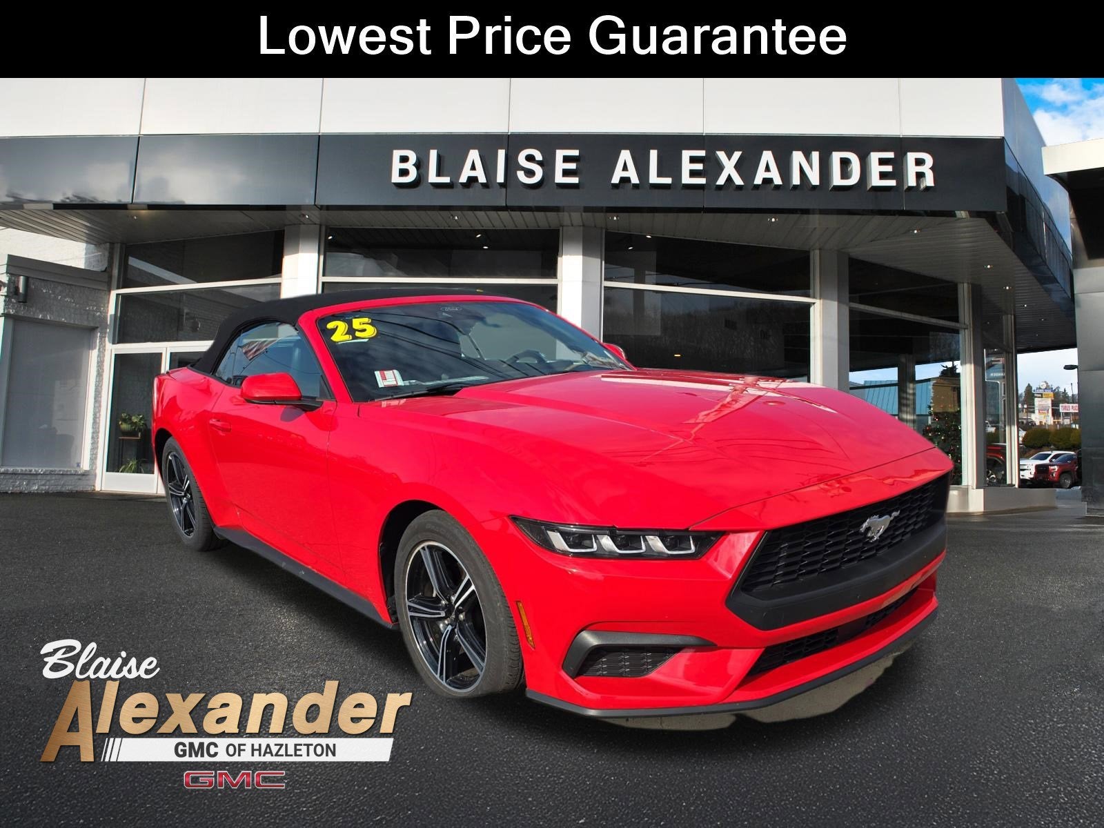 2025 Ford Mustang EcoBoost in Race Red — front three-quarter view