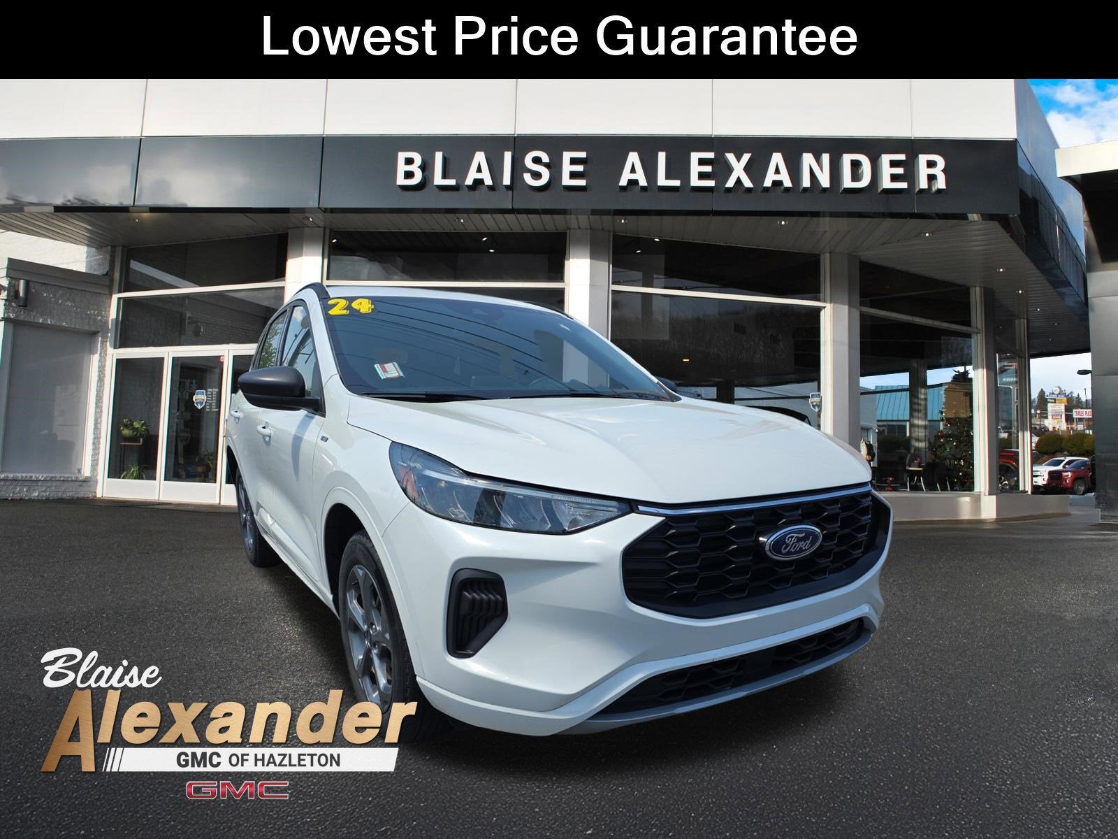2024 Ford Escape ST-Line in White — front three-quarter view