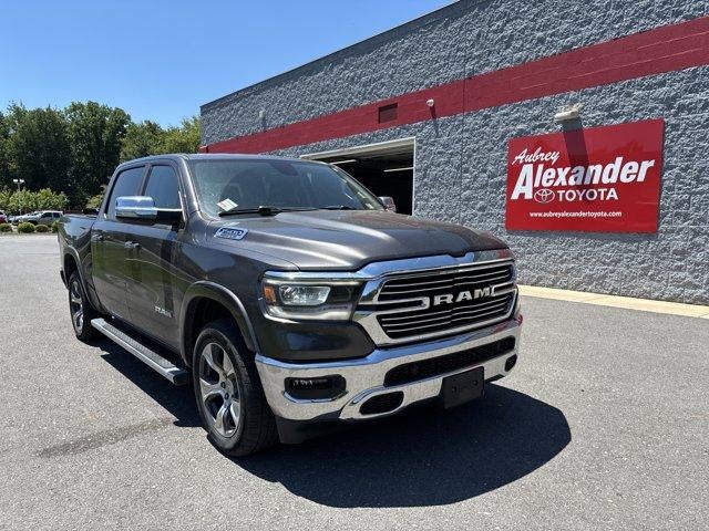 2019 RAM 1500 Laramie 4x4 Crew Cab 5'7" Box in Granite Crystal Metallic Clearcoat — front three-quarter view