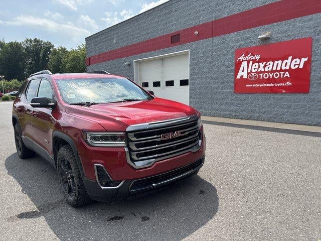 2022 GMC Acadia AWD AT4 in Cayenne Red Tintcoat — front three-quarter view