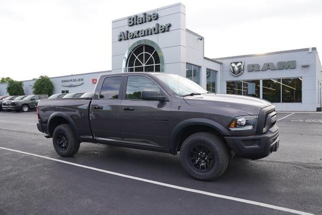2023 RAM 1500 Classic Warlock 4x4 Quad Cab 6'4" Box in Granite Crystal Metallic Clearcoat — front three-quarter view