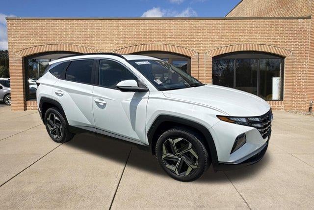 2023 Hyundai TUCSON SEL AWD in Serenity White Pearl — front three-quarter view