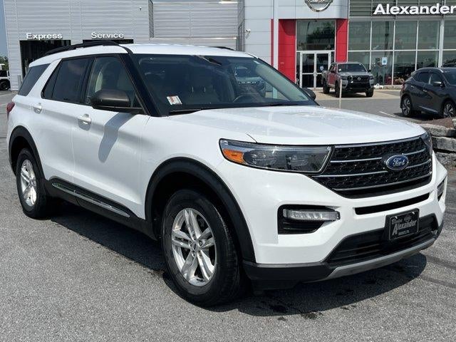 2023 Ford Explorer XLT 4WD in Oxford White — front three-quarter view