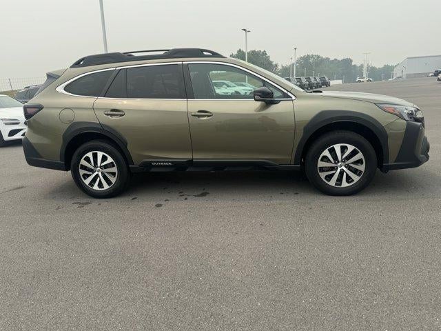 2025 Subaru Outback Premium AWD in Autumn Green Metallic — front three-quarter view