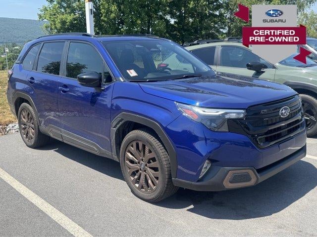 2026 Subaru Forester Sport AWD in Sapphire Blue Pearl — front three-quarter view