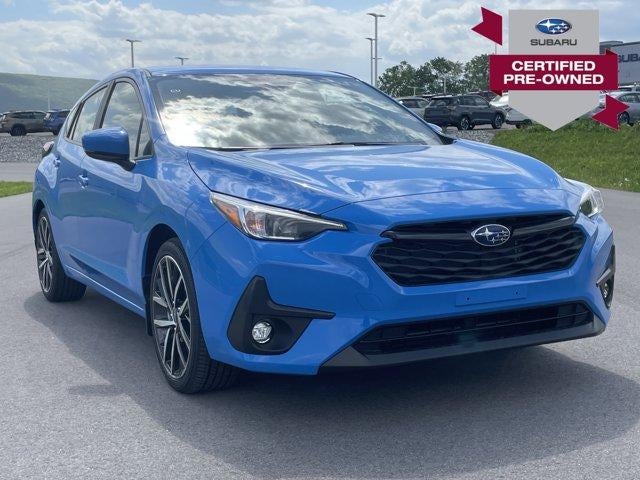 2025 Subaru Impreza Sport AWD in Oasis Blue Pearl — front three-quarter view