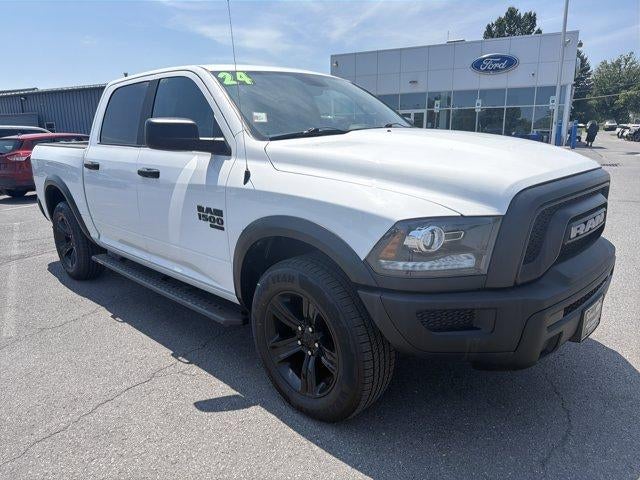 2024 RAM 1500 Classic Warlock 4x4 Crew Cab 5'7" Box in Bright White Clearcoat — front three-quarter view