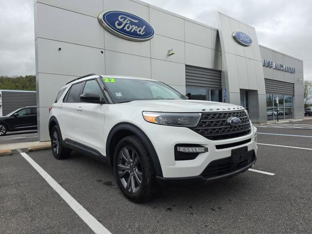 2022 Ford Explorer XLT 4WD in Star White Metallic Tri Coat — front three-quarter view