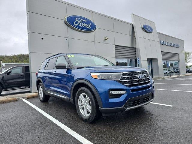 2022 Ford Explorer XLT 4WD in Atlas Blue Metallic — front three-quarter view