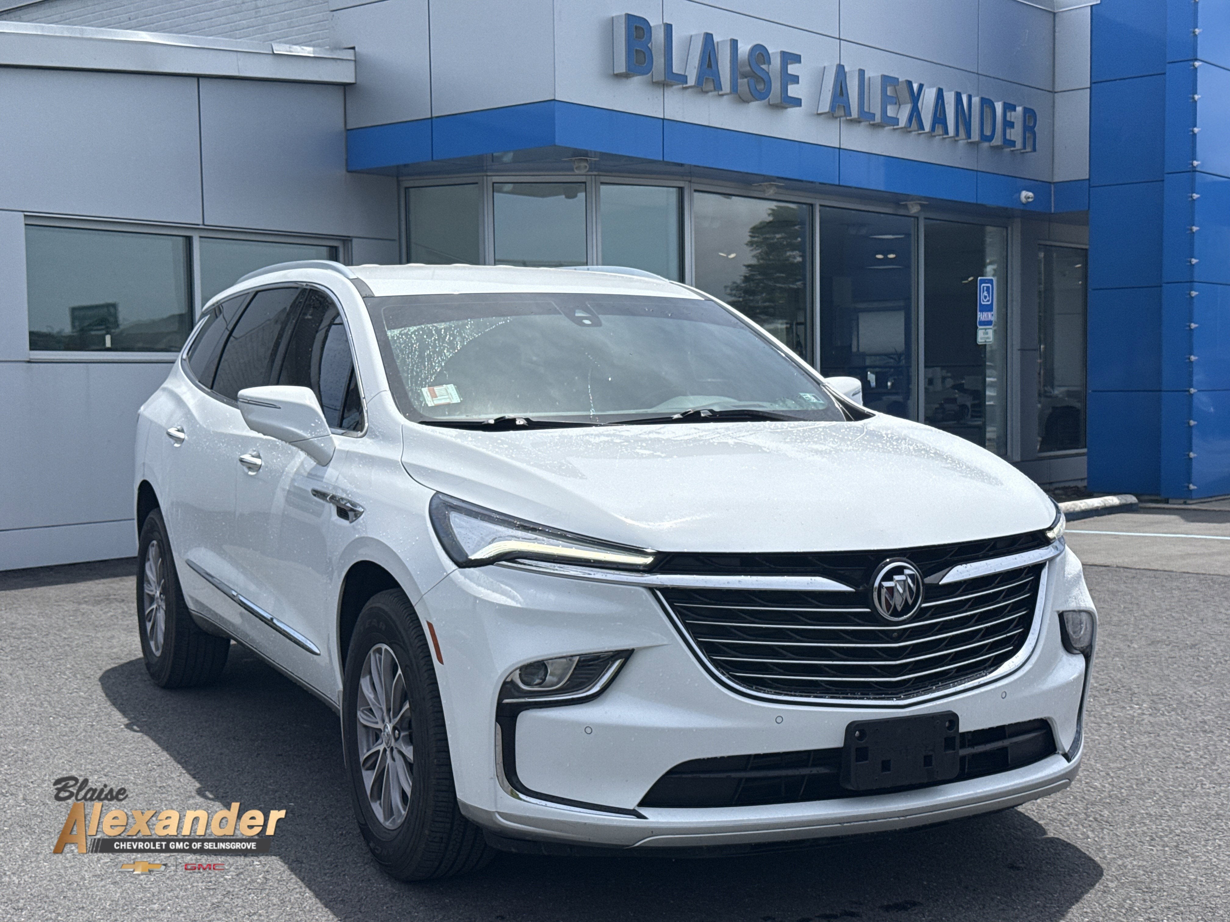 2024 Buick Enclave Premium in Summit White — front three-quarter view