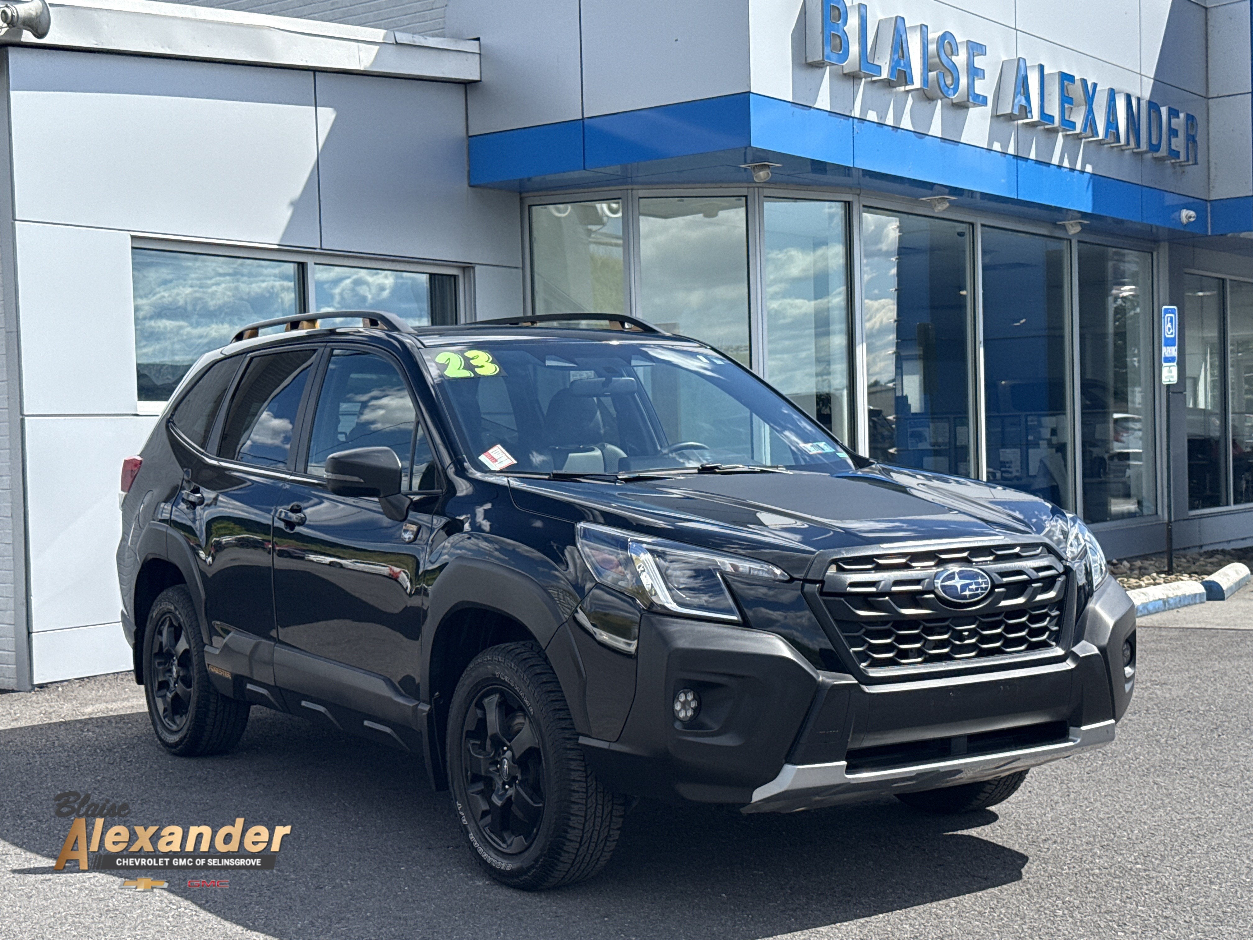 2023 Subaru Forester Wilderness in Crystal Black S — front three-quarter view